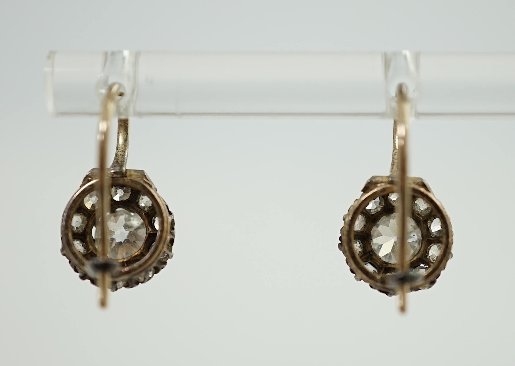 A pair of late Victorian gold and diamond cluster set earrings